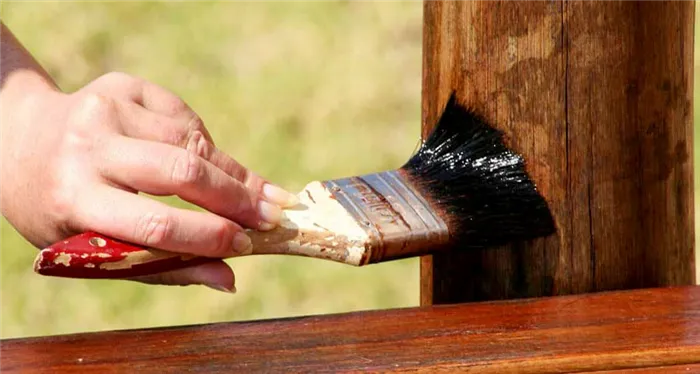 Процесс осмаливания древесины